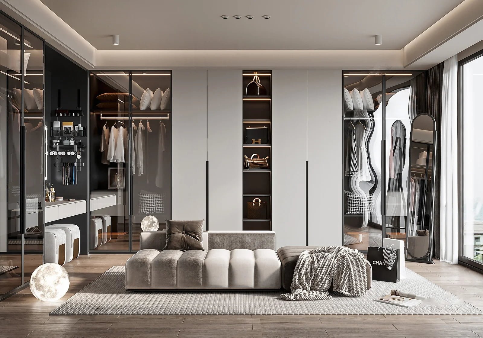 modern walk in closet with glass wardrobe doors and luxury seating area